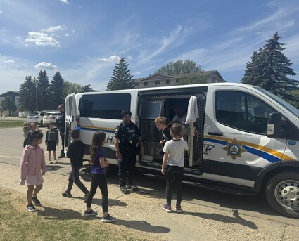Photo of students checking out Sheriff van